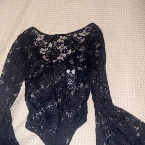 NEW body suit, never worn , tags attached .